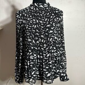 Long sleeve flowy top with bottom up back